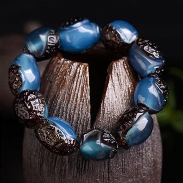 Bracelet worn on wrist, symbolizing wealth attraction and Feng Shui harmony in daily life.