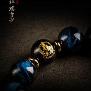 Elegant bracelet in natural lighting, highlighting its harmony of earthy tones and spiritual symbolism.