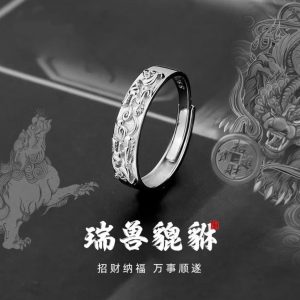 Elegant open-ended Feng Shui ring featuring the mythical Pi Xiu for financial abundance.