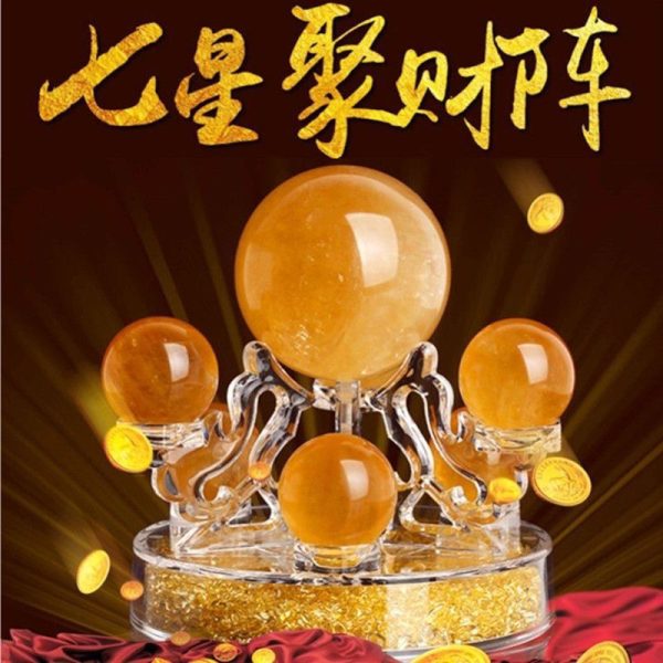 Golden citrine crystal spheres arranged in a sacred seven-star Feng Shui formation for wealth and prosperity.