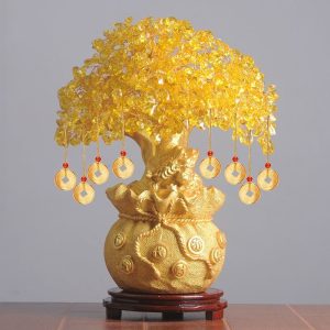 Golden crystal money tree ornament with blooming flowers, attracting wealth and prosperity in Feng Shui.