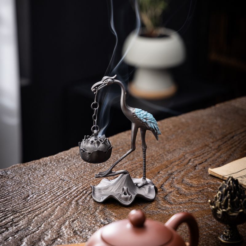 Hanging incense burner in use, filling a serene room with fragrant smoke and positive energy.