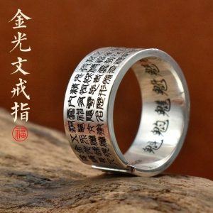 Model wearing the adjustable mantra ring on the index finger, symbolizing empowerment and wealth attraction.