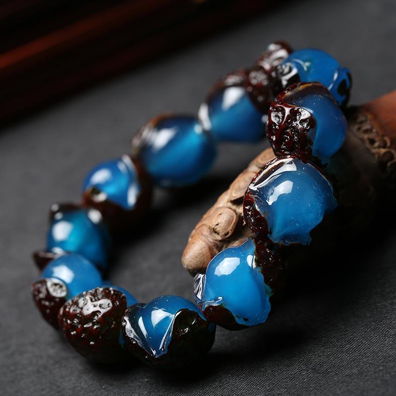 Natural irregular-shaped Blue Amber beads, showcasing unique raw beauty and spiritual potency.