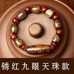 Unisex mala bracelet worn on wrist, radiating spiritual protection and wealth-attracting energy.