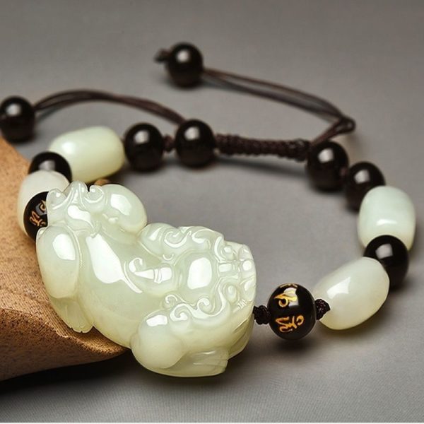 Wear this Feng Shui bracelet daily to invite financial luck and shield against negative energy.