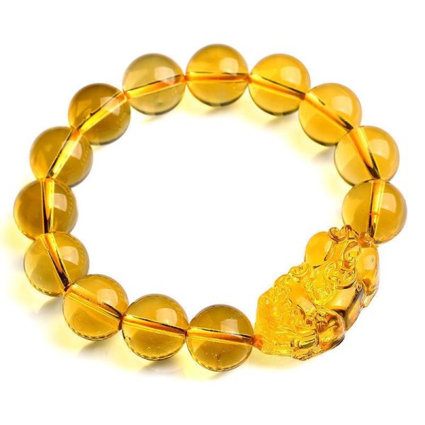 Natural Yellow Citrine Pi Yao Bracelet glowing with golden energy, symbolizing wealth and success.