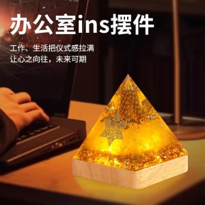 Natural citrine crystal pyramid radiating prosperity energy, perfect for desk decor and financial success