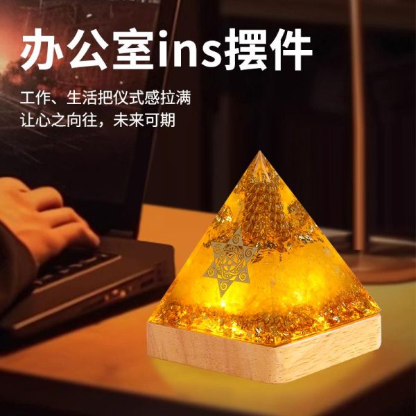 Natural citrine crystal pyramid radiating prosperity energy, perfect for desk decor and financial success