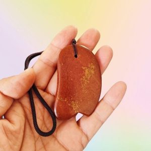 Daily self-care ritual with a Gua Sha tool to balance chi and skin health