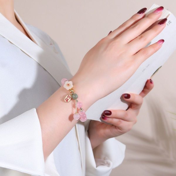 Elegant adjustable bracelet designed to enhance romantic opportunities and self-confidence.