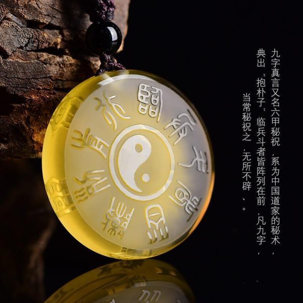 Close-up of Five Sacred Mountains symbol on citrine, symbolizing earthly stability and cosmic harmony.