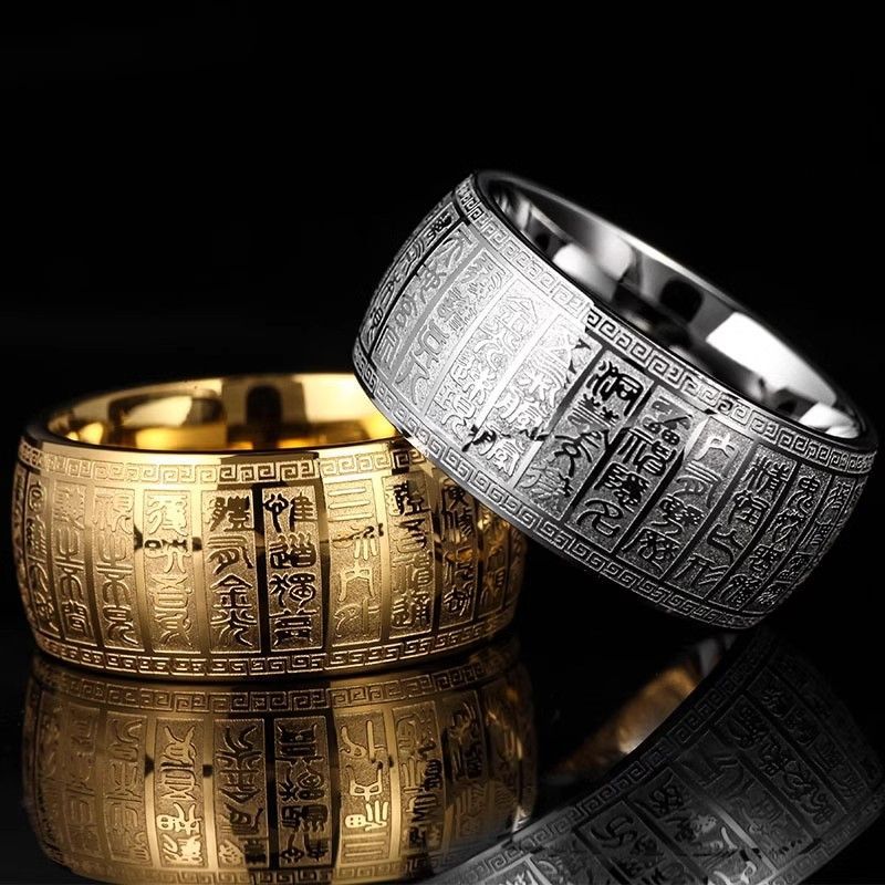 Close-up of the titanium steel ring engraved with intricate Daoist Golden Light Mantra script, radiating spiritual energy.