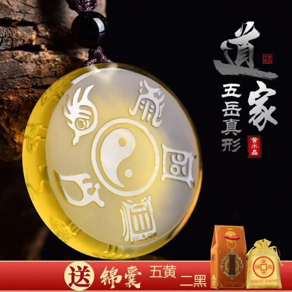 Golden citrine pendant engraved with ancient Daoist Nine Sacred Words, radiating wealth and protection energy.