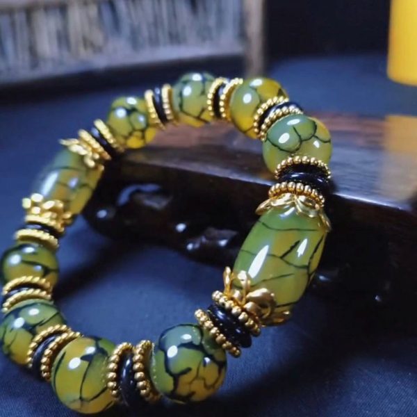 Tibetan Authentic Agate Three Nine-Eye Dzi Bead... image 5, showing product details and features.*
